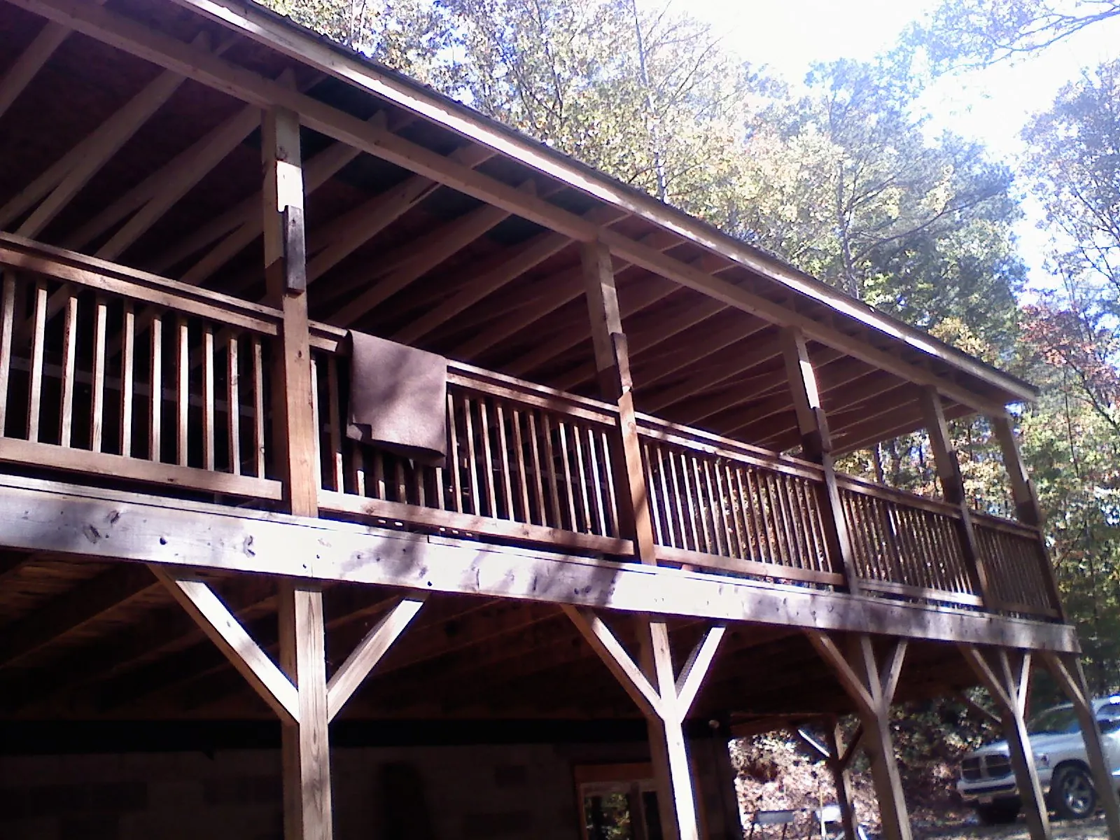 Timber framing under a new elevated porch and deck — Roof Leak Repair in Jewett City by Roofing Brothers